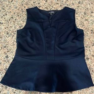 The limited sleeveless top size medium navy blue